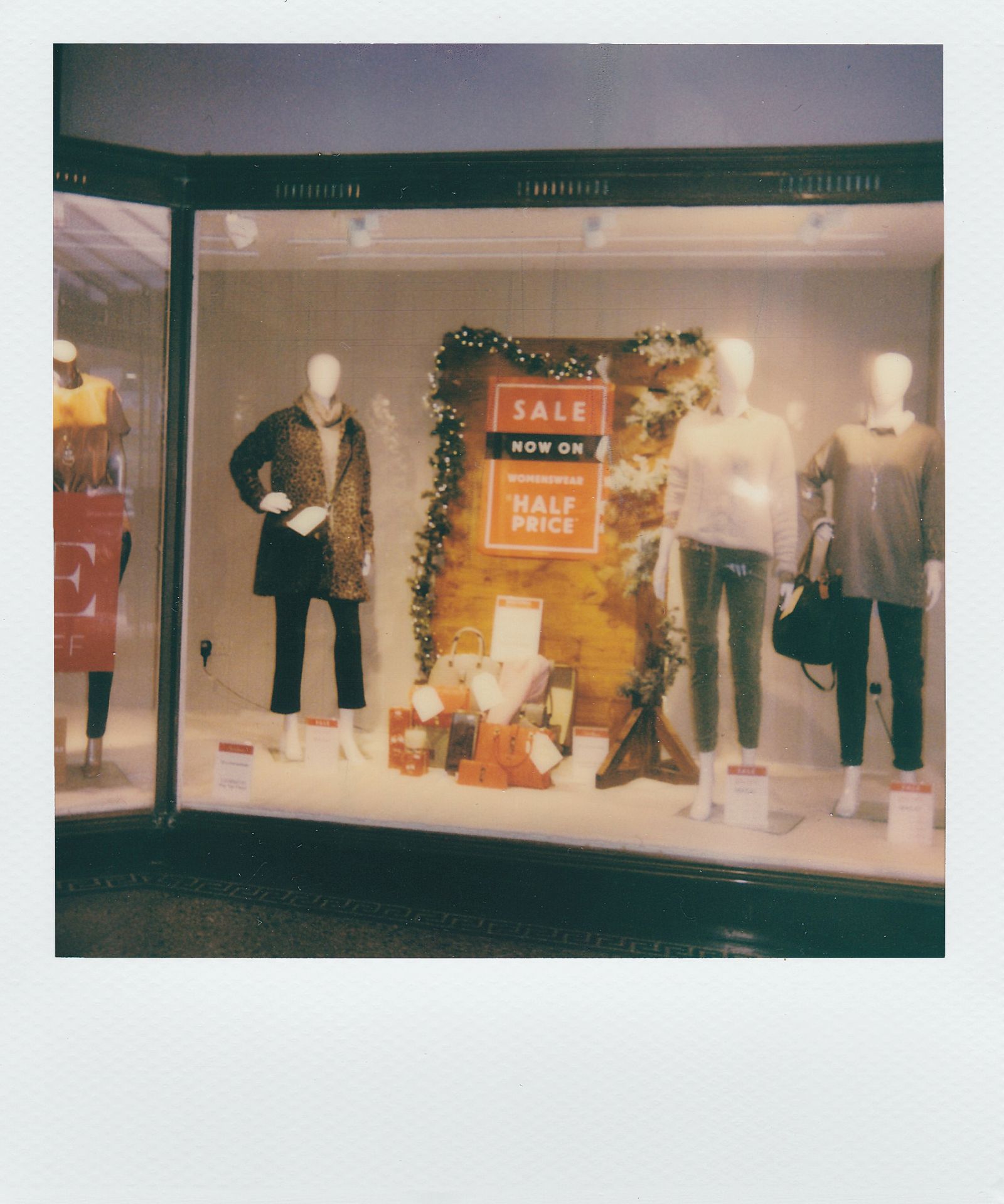 Brown leather coat on display